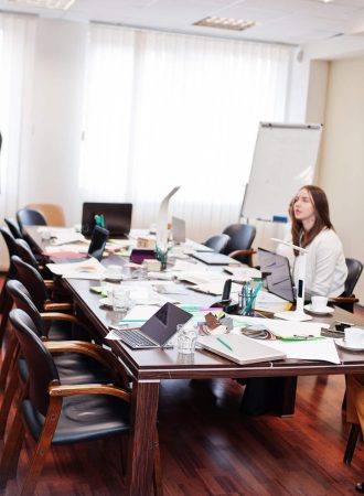 Diverse business people on a meeting at round table.
